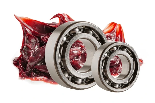 Grease merah untuk aplikasi industri berat seperti excavator dan gearbox